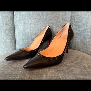 Christian Louboutin spiked heels size 39.5. Wear on soles. 3” heel